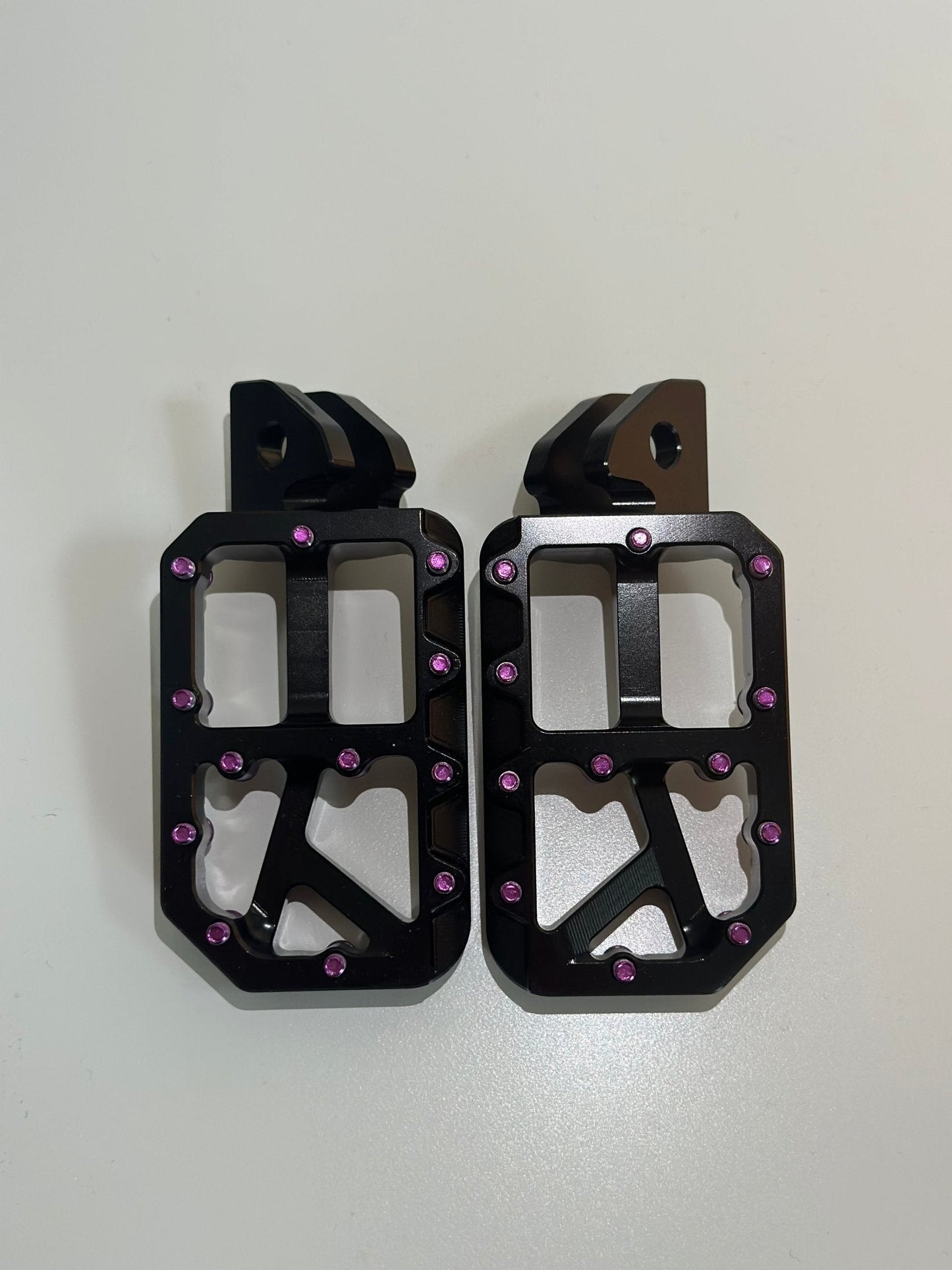 Black foot pegs