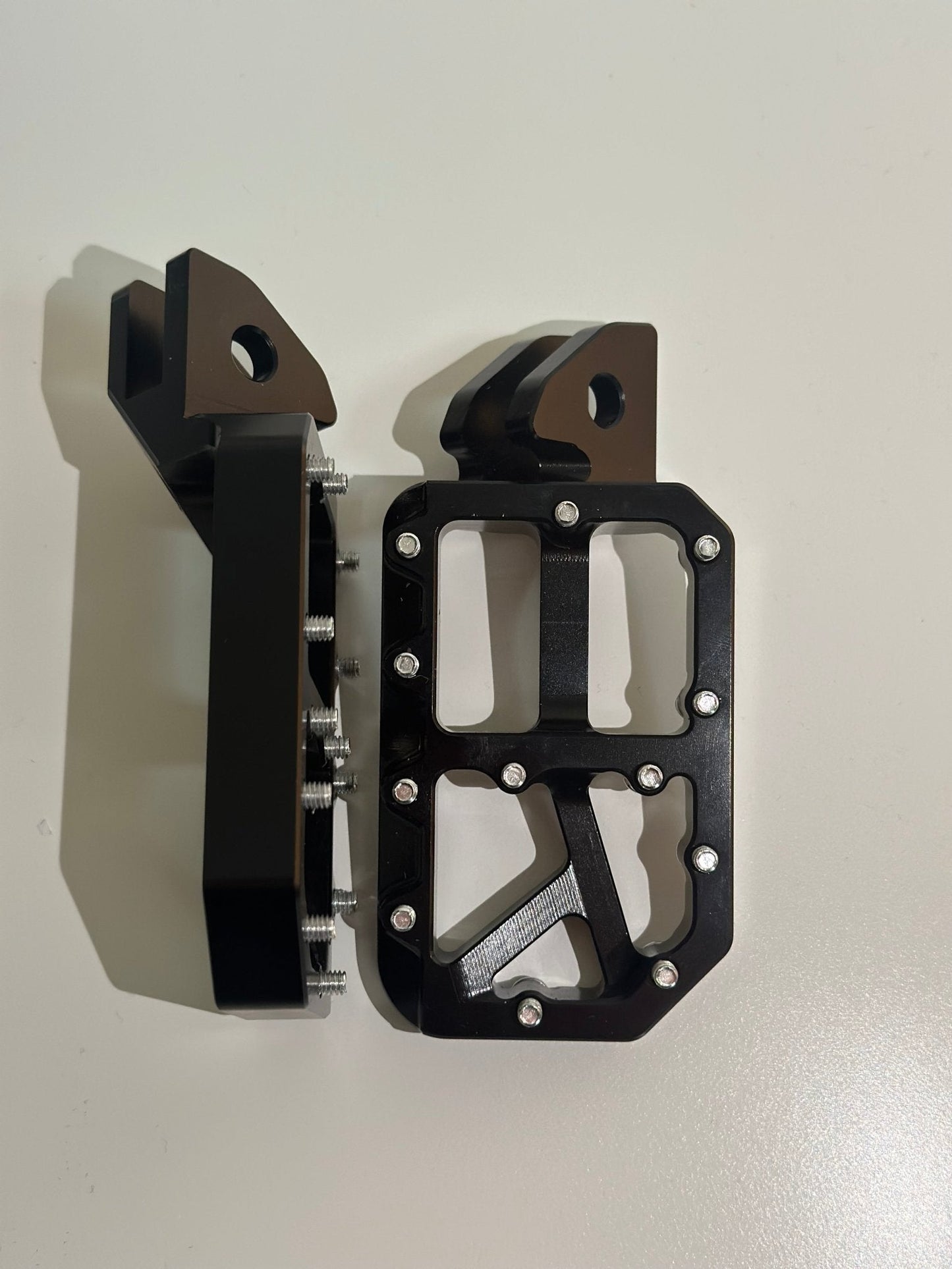 Black foot pegs